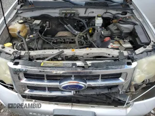 2008 Ford Escape XLS z VIN 1FMCU02Z88KB09430, wystawiony jako Copart lot #58158645 z przebiegiem 216 763 mil mil oraz Czysty tytuł • Clean title. Historia ofert i sprzedaży dostępna na DreamBid. Obrazek 12.