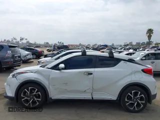 2019 Toyota C-HR XLE with VIN JTNKHMBX9K1054053, listed as a IAAI auction lot 42120256 with 67,083 mi miles and . Bid and sale history available at DreamBid. Image 14.