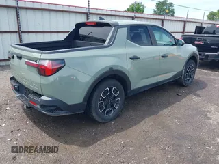 2022 Hyundai Santa Cruz SEL with VIN 5NTJB4AEXNH034989, listed as a IAAI auction lot 42176050 with 27,297 mi miles and . Bid and sale history available at DreamBid. Image 4.