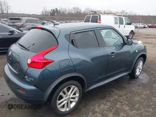 2013 Nissan Juke S with VIN JN8AF5MV7DT209881, listed as a IAAI auction lot 41728623 with 185,296 mi miles and . Bid and sale history available at DreamBid. Image 4.