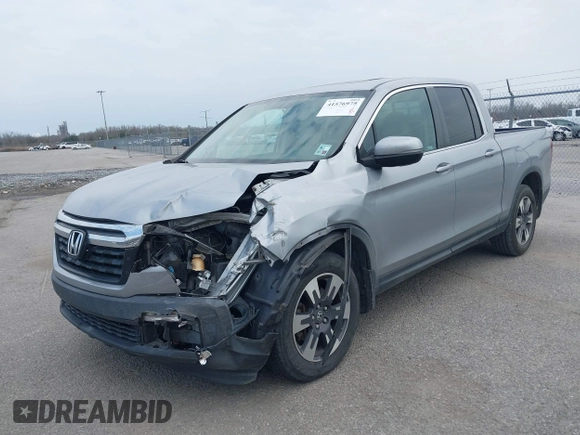 2019 Honda Ridgeline RTL with VIN 5FPYK2F50KB004055, listed as a IAAI auction lot 41576975 with 128,620 mi miles and . Bid and sale history available at DreamBid. Image 17.