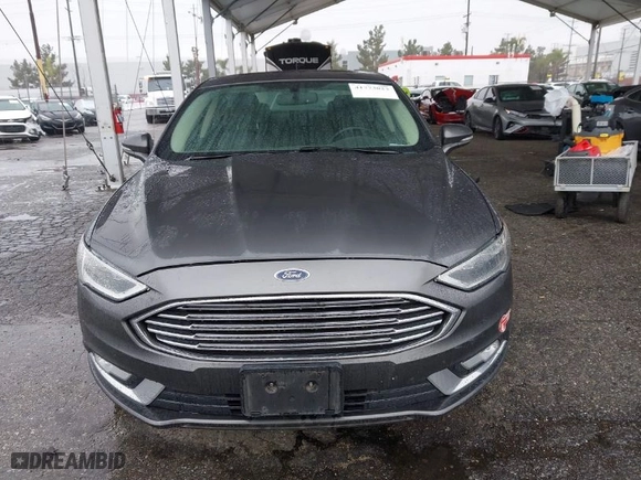 2017 Ford Fusion Energi Titanium with VIN 3FA6P0SU8HR329570, listed as a IAAI auction lot 41773023 with 112,022 mi miles. Bid and sale history available at carsss.com. Image 13.