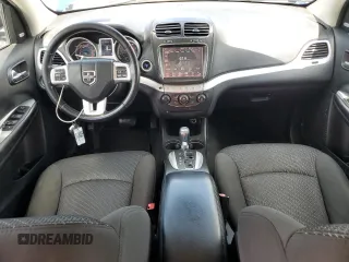 2012 Dodge Journey SXT with VIN 3C4PDCBG8CT231640, listed as a Copart auction lot 60625465 with 131,358 mi miles and Salvage title. Bid and sale history available at DreamBid. Image 8.