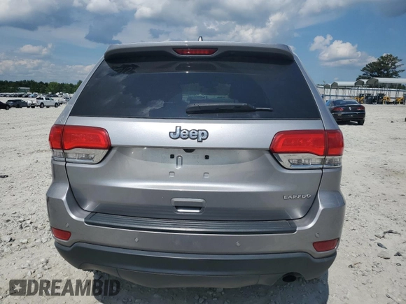 2018 Jeep Grand Cherokee Altitude with VIN 1C4RJEAG0JC412397, listed as a Copart auction lot 56246335 with 37,581 mi miles and Salvage title. Bid and sale history available at DreamBid. Image 6.