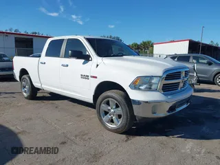 2015 Ram 1500 Big Horn z VIN 1C6RR7TM9FS740459, wystawiony jako IAAI lot #41422104 z przebiegiem 55 396 mil mil oraz . Historia ofert i sprzedaży dostępna na DreamBid. Obrazek 1.