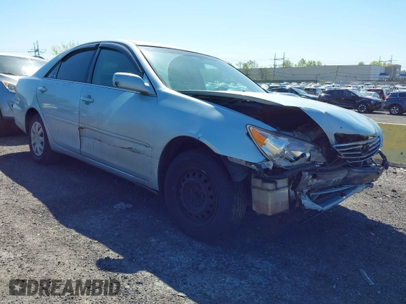 2005 Toyota Camry STD z VIN 4T1BE32K65U994854, wystawiony jako IAAI lot #42137074 z przebiegiem 104 051 mil mil oraz . Historia ofert i sprzedaży dostępna na DreamBid. Obrazek 1.