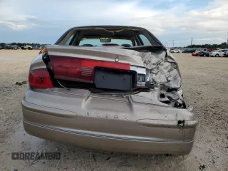 1999 Buick Regal LS with VIN 2G4WB52K4X1601132, listed as a Copart auction lot 73761404 with 92,842 mi miles and Salvage Title. Bid and sale history available at carsss.com. Image 6.