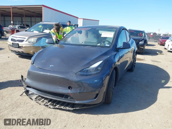2022 Tesla Model Y Performance z VIN 7SAYGDEF8NF494753, wystawiony jako IAAI lot #41692464 z przebiegiem 14 616 mil mil oraz . Historia ofert i sprzedaży dostępna na DreamBid. Obrazek 2.