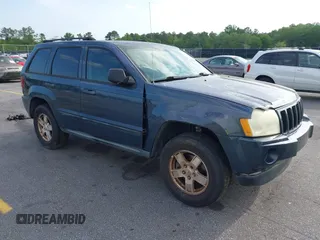 2007 Jeep Grand Cherokee Laredo with VIN 1J8GS48K17C684497, listed as a IAAI auction lot 42136314 with 155,024 mi miles. Bid and sale history available at carsss.com. Image 1.