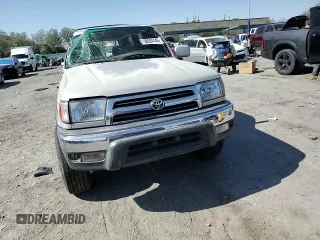 1999 Toyota 4Runner SR5 with VIN JT3GN86R4X0099618, listed as a Copart auction lot 58204145 with 297,759 mi miles and Salvage title. Bid and sale history available at DreamBid. Image 14.