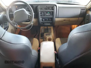 2000 Jeep Cherokee Classic with VIN 1J4FF58S8YL135534, listed as a Copart auction lot 62211335 with 108,888 mi miles and Salvage title. Bid and sale history available at DreamBid. Image 8.