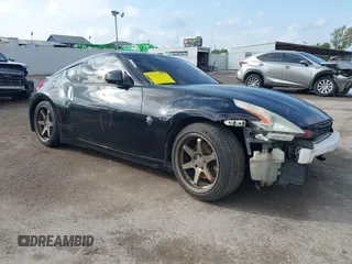2015 Nissan 370Z Sport with VIN JN1AZ4EH8FM443095, listed as a IAAI auction lot 41105775 with 135,354 mi miles. Bid and sale history available at carsss.com. Image 1.