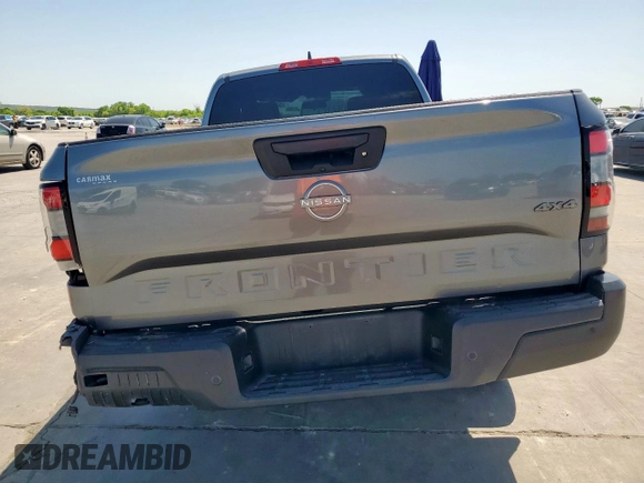 2022 Nissan Frontier S with VIN 1N6ED1CM7NN632998, listed as a Copart auction lot 52043135 with 33,286 mi miles and Salvage title. Bid and sale history available at DreamBid. Image 6.