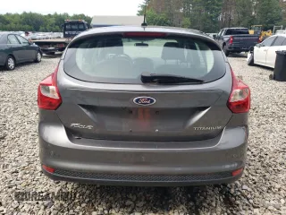 2014 Ford Focus Titanium z VIN 1FADP3N23EL365678, wystawiony jako Copart lot #64418025 z przebiegiem Nie podano mil oraz Czysty tytuł • Clean title. Historia ofert i sprzedaży dostępna na DreamBid. Obrazek 6.
