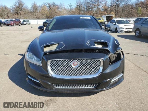 2015 Jaguar XJ with VIN SAJWA2GT2FMV84567, listed as a Copart auction lot 45231514 with 60,717 mi miles and . Bid and sale history available at DreamBid. Image 5.
