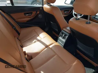 2013 BMW 3 Series 328i xDrive with VIN WBA3B5C52DF599074, listed as a IAAI auction lot 42408547 with 158,050 mi miles and . Bid and sale history available at DreamBid. Image 8.
