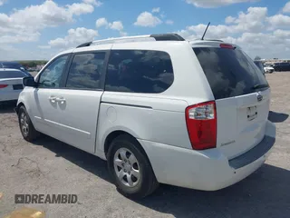 2010 Kia Sedona LX with VIN KNDMG4C33A6338047, listed as a IAAI auction lot 42128485 with 99,498 mi miles and . Bid and sale history available at carsss.com. Image 3.