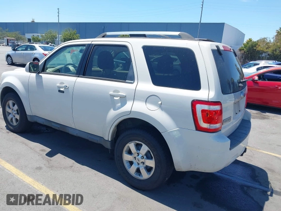 2011 Ford Escape Limited z VIN 1FMCU0EGXBKC04959, wystawiony jako IAAI lot #42846594 z przebiegiem 147 811 mil mil oraz . Historia ofert i sprzedaży dostępna na DreamBid. Obrazek 3.