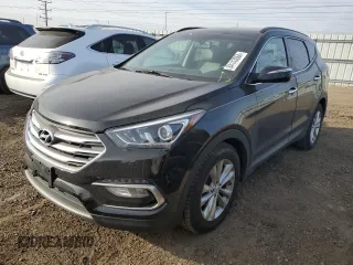 2017 Hyundai Santa Fe 2.0T z VIN 5XYZUDLA1HG479476, wystawiony jako Copart lot #84143064 z przebiegiem 91 667 mil mil oraz Szkoda całkowita • Salvage title. Historia ofert i sprzedaży dostępna na DreamBid. Obrazek 1.