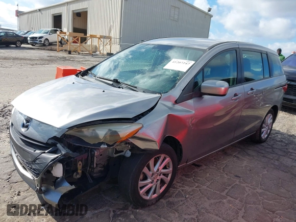2012 Mazda 5 Sport with VIN JM1CW2BLXC0101310, listed as a IAAI auction lot 41207247 with 146,691 mi miles. Bid and sale history available at carsss.com. Image 17.