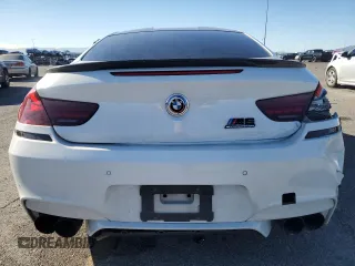 2015 BMW M6 z VIN WBSLX9C54FD160753, wystawiony jako Copart lot #83486484 z przebiegiem 80 275 mil mil oraz Szkody całkowita. Historia ofert i sprzedaży dostępna na DreamBid. Obrazek 6.