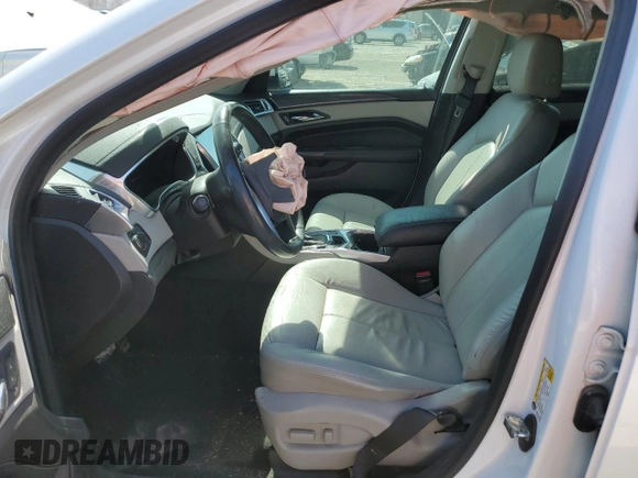 2014 Cadillac SRX with VIN 3GYFNAE32ES667019, listed as a Copart auction lot 49008165 with 98,995 mi miles and Salvage Title. Bid and sale history available at DreamBid. Image 7.