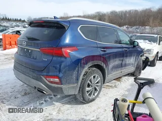 2020 Hyundai Santa Fe Limited with VIN 5NMS5CAD6LH197791, listed as a IAAI auction lot 41592295 with 69,118 mi miles. Bid and sale history available at carsss.com. Image 4.