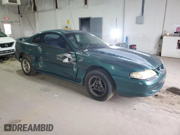 1996 Ford Mustang with VIN 1FALP4047TF229334, listed as a Copart auction lot 49257335 with 184,986 mi miles and Salvage Title. Bid and sale history available at carsss.com. Image 4.