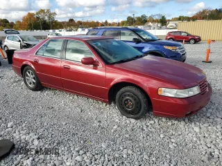 1999 Cadillac Seville Touring STS z VIN 1G6KY5490XU919543, wystawiony jako Copart lot #77068624 z przebiegiem 142 772 mil mil oraz Szkoda całkowita • Salvage title. Historia ofert i sprzedaży dostępna na DreamBid. Obrazek 4.