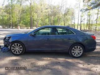 2015 Chevrolet Malibu LT with VIN 1G11D5SL1FF245966, listed as a IAAI auction lot 42071918 with 19,448 mi miles and . Bid and sale history available at DreamBid. Image 14.