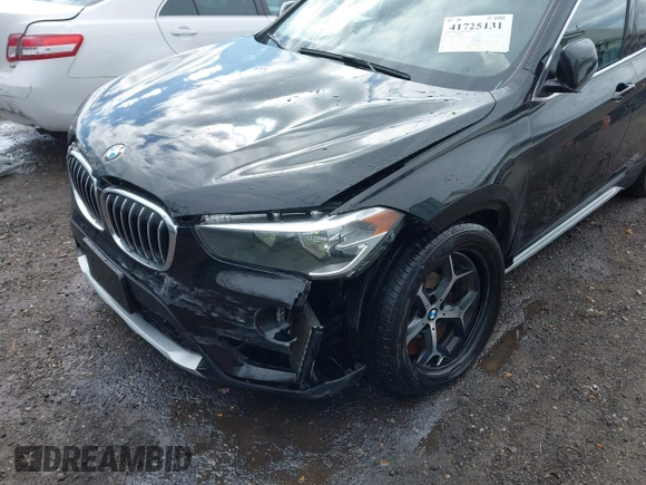 2018 BMW X1 xDrive28i z VIN WBXHT3C35J5L34646, wystawiony jako IAAI lot #41725131 z przebiegiem 81 983 mil mil oraz . Historia ofert i sprzedaży dostępna na DreamBid. Obrazek 6.