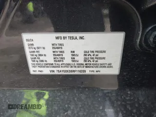 2024 Tesla Model Y with VIN 7SAYGDED8RF116209, listed as a IAAI auction lot 41761804 with 12,048 mi miles and . Bid and sale history available at DreamBid. Image 9.