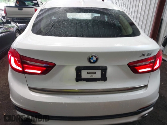 2015 BMW X6 sDrive35i z VIN 5UXKU0C54F0F91660, wystawiony jako IAAI lot #42375390 z przebiegiem 150 209 mil mil oraz . Historia ofert i sprzedaży dostępna na DreamBid. Obrazek 16.