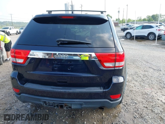 2011 Jeep Grand Cherokee Laredo with VIN 1J4RR4GG5BC622628, listed as a IAAI auction lot 42402893 with 163,731 mi miles and . Bid and sale history available at DreamBid. Image 17.