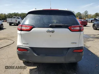 2016 Jeep Cherokee Altitude with VIN 1C4PJLCB9GW209643, listed as a Copart auction lot 47996565 with 167,005 mi miles and Salvage Title. Bid and sale history available at carsss.com. Image 6.