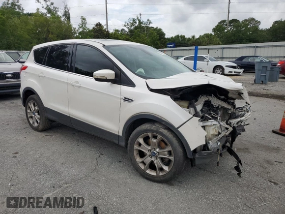 2013 Ford Escape SEL z VIN 1FMCU9HX4DUB05173, wystawiony jako Copart lot #57918125 z przebiegiem 197 195 mil mil oraz Szkoda całkowita • Salvage title. Historia ofert i sprzedaży dostępna na DreamBid. Obrazek 4.