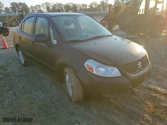 2013 Suzuki SX4 LE with VIN JS2YC5A34D6102748, listed as a Copart auction lot 74253634 with 44,386 mi miles and Salvage Title. Bid and sale history available at carsss.com. Image 11.