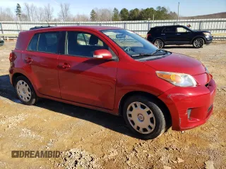 2012 Scion xD with VIN JTKKU4B45C1025911, listed as a Copart auction lot 84477054 with 102,953 mi miles and Salvage Title. Bid and sale history available at DreamBid. Image 4.
