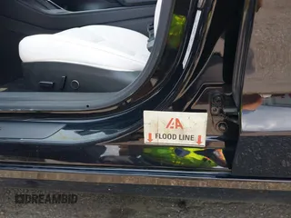 2023 Tesla Model 3 z VIN 5YJ3E1EA4PF565899, wystawiony jako IAAI lot #42436473 z przebiegiem 30 141 mil mil oraz . Historia ofert i sprzedaży dostępna na DreamBid. Obrazek 6.