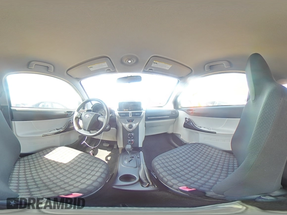 2012 Scion iQ z VIN JTNJJXB07CJ018481, wystawiony jako Copart lot #54014265 z przebiegiem 54 331 mil mil oraz Szkoda całkowita • Salvage title. Historia ofert i sprzedaży dostępna na DreamBid. Obrazek 14.