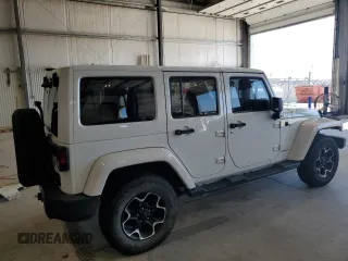 2015 Jeep Wrangler Unlimited Sahara with VIN 1C4BJWEG2FL620001, listed as a Copart auction lot 63914725 with 114,810 mi miles and Salvage title. Bid and sale history available at DreamBid. Image 3.