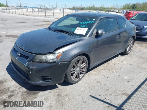 2013 Scion tC with VIN JTKJF5C73D3061994, listed as a IAAI auction lot 41785859 with 133,610 mi miles. Bid and sale history available at carsss.com. Image 2.