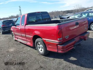 2000 Ford F-150 XL with VIN 2FTRX17W2YCA79002, listed as a IAAI auction lot 41605570 with 322,154 mi miles. Bid and sale history available at carsss.com. Image 3.