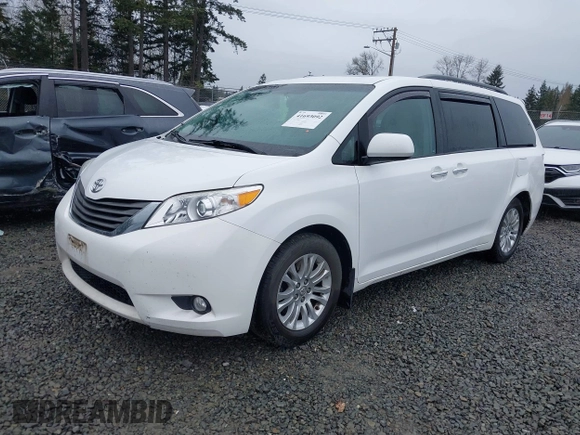 2014 Toyota Sienna XLE with VIN 5TDYK3DC2ES485846, listed as a IAAI auction lot 41693092 with 106,156 mi miles and . Bid and sale history available at DreamBid. Image 18.