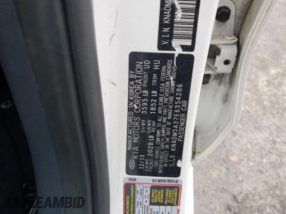 2014 Kia Rio LX with VIN KNADM5A37E6354286, listed as a Copart auction lot 79502914 with 113,826 mi miles and Salvage Title. Bid and sale history available at carsss.com. Image 13.