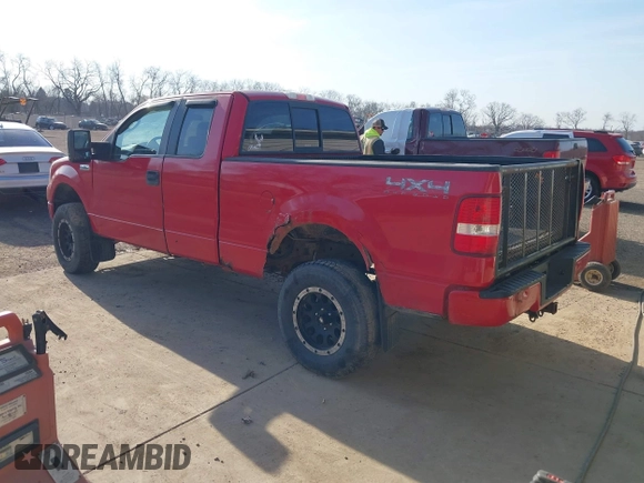 2005 Ford F-150 STX with VIN 1FTRX14W35NA68052, listed as a IAAI auction lot 41768704 with 146,336 mi miles. Bid and sale history available at carsss.com. Image 3.