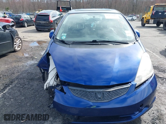 2009 Honda Fit Sport with VIN JHMGE88459S053654, listed as a IAAI auction lot 42036062 with 190,246 mi miles. Bid and sale history available at carsss.com. Image 6.