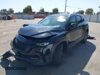 2023 Mazda CX-50 Meridian Edition z VIN 7MMVABXY1PN149136, wystawiony jako IAAI lot #42587764 z przebiegiem 4 748 mil mil oraz . Historia ofert i sprzedaży dostępna na DreamBid. Obrazek 2.