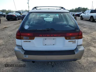 1999 Subaru Legacy Outback with VIN 4S3BG6850X7649578, listed as a Copart auction lot 56654155 with 174,651 mi miles and Salvage title. Bid and sale history available at DreamBid. Image 6.