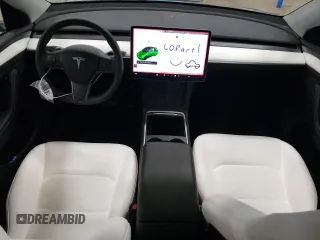 2023 Tesla Model Y Long Range with VIN 7SAYGDEE7PA180793, listed as a Copart auction lot 46706855 with 18,136 mi miles and Non Repairable. Bid and sale history available at DreamBid. Image 8.
